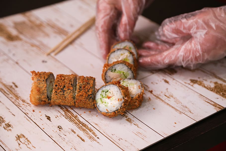 rolls, sushi, bamboo, food, food and drink, freshness, human hand HD wallpaper