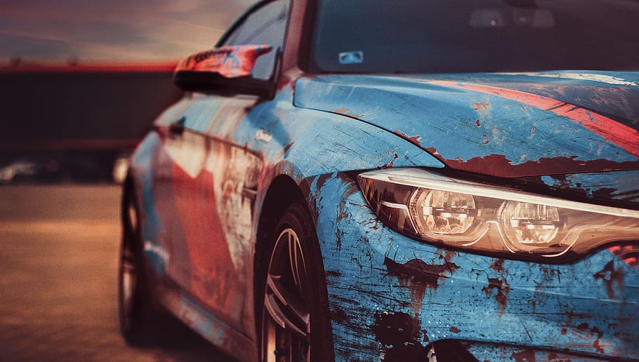 selective focus photography of BMW S Series car, light, livery