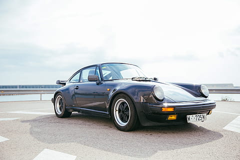 Side view of a black sports car with single door, Bumper, Chrome HD wallpaper