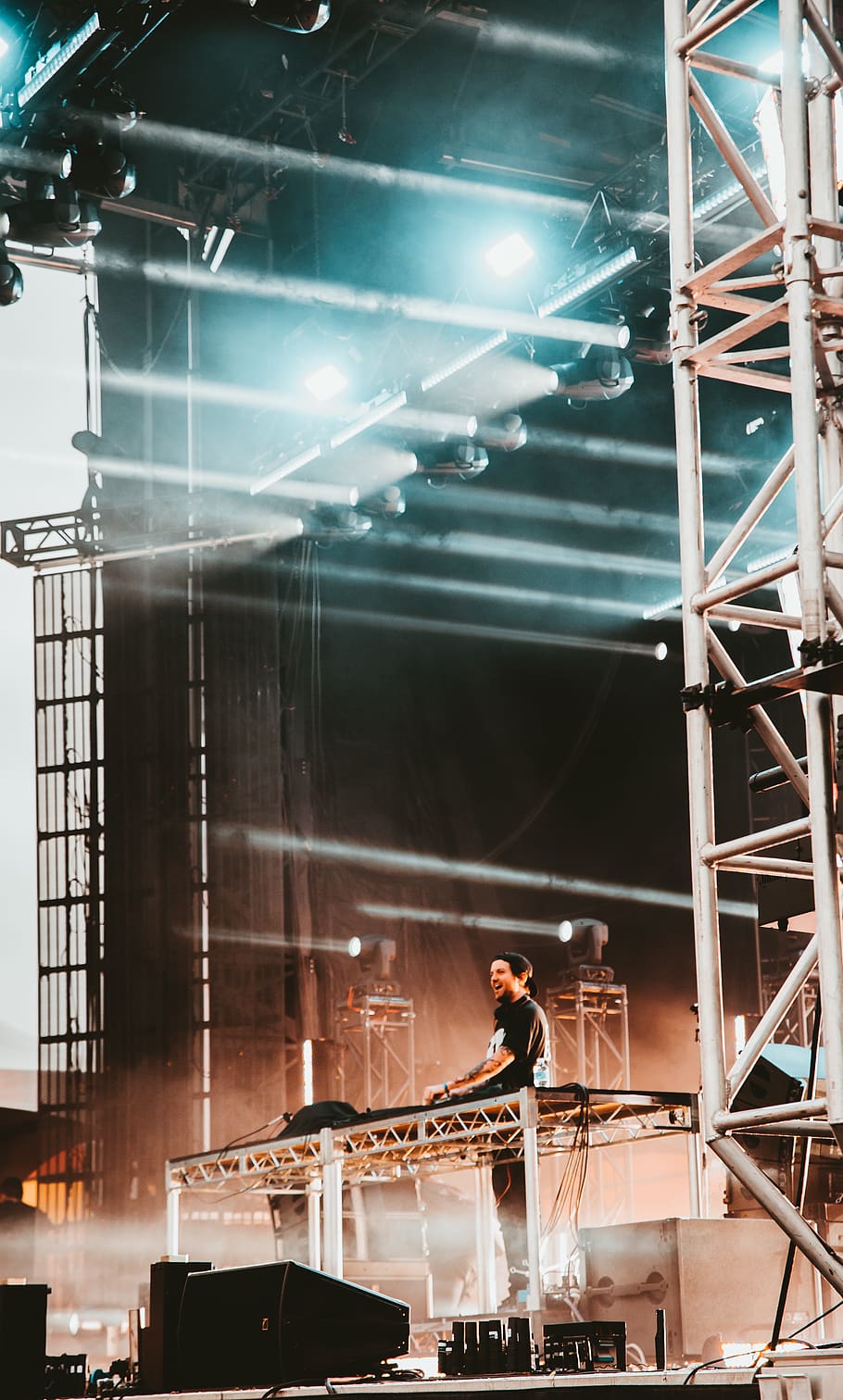 man standing while playing music, illuminated, indoors, real people HD wallpaper