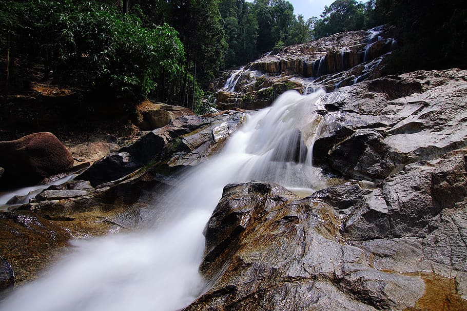Waterfalls on Rocks Surrounded by Trees, beautiful, cascade, environment HD wallpaper