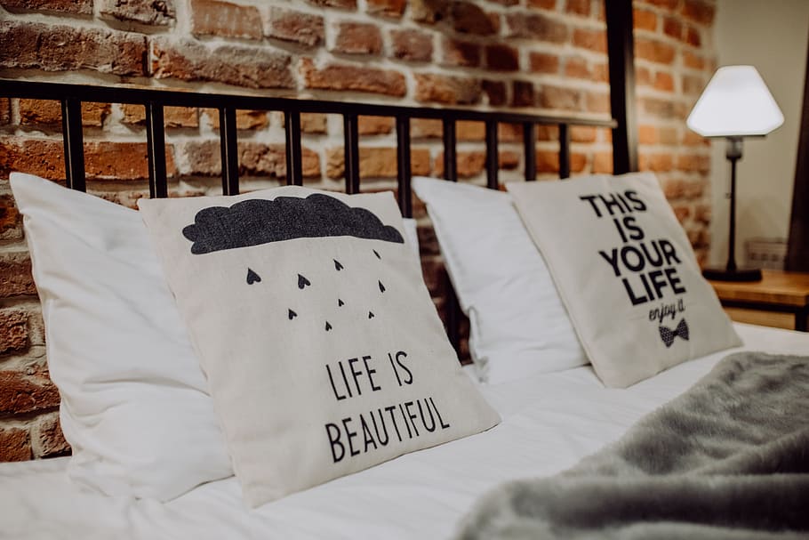 Enjoying evening with a Macbook in a nice bed, home, loft, brick wall HD wallpaper