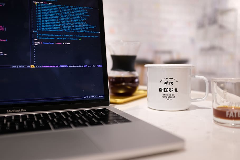 MacBook Pro turned on, cup, electronics, computer, pc, laptop HD wallpaper