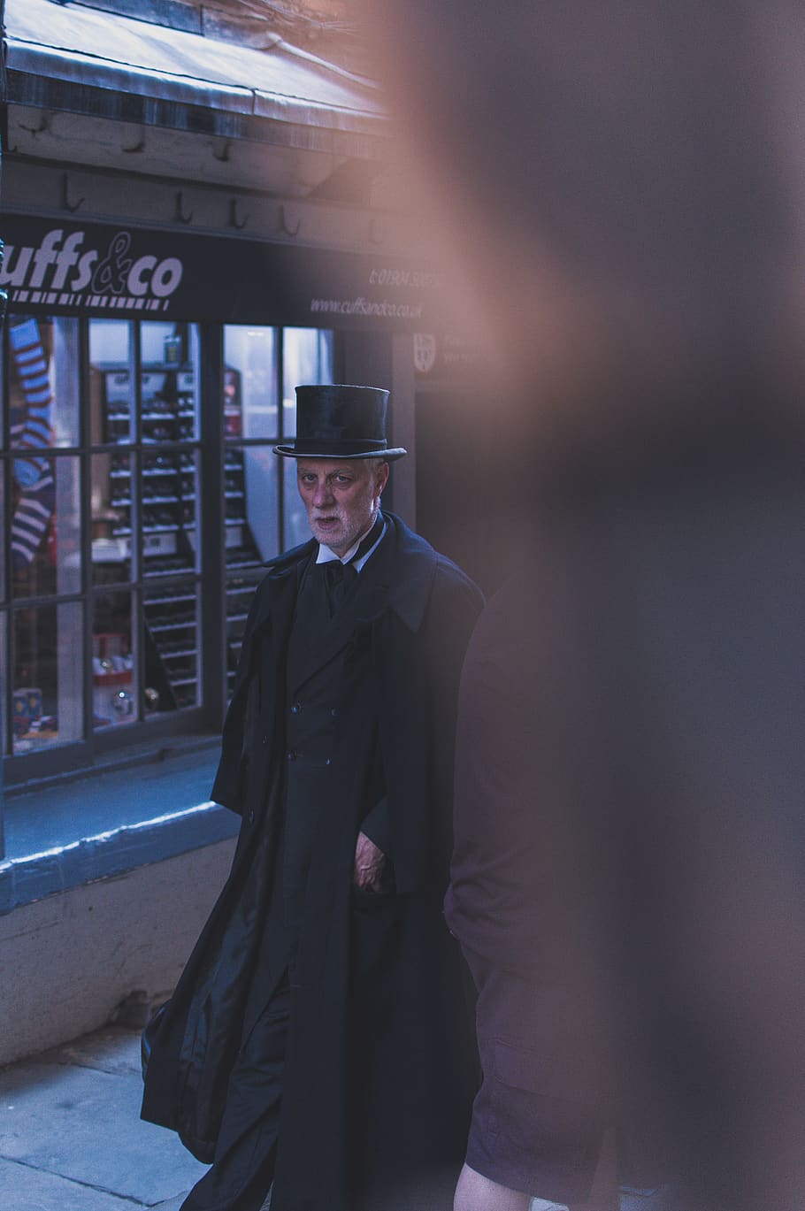 man walking outside the store, person, human, people, overcoat HD wallpaper