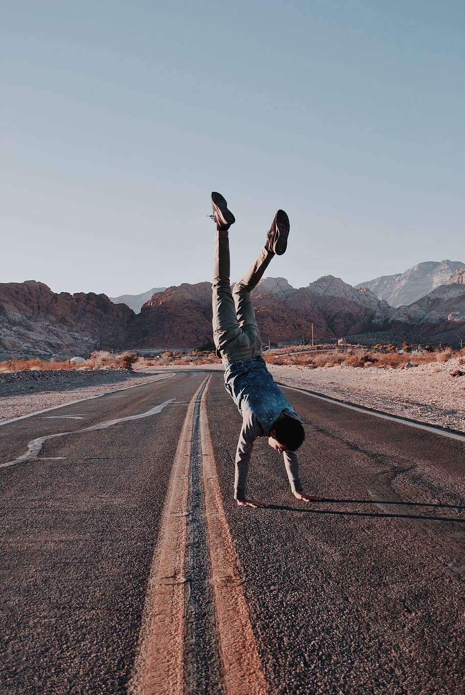 man on highway, sky, full length, clear sky, one person, mountain HD wallpaper