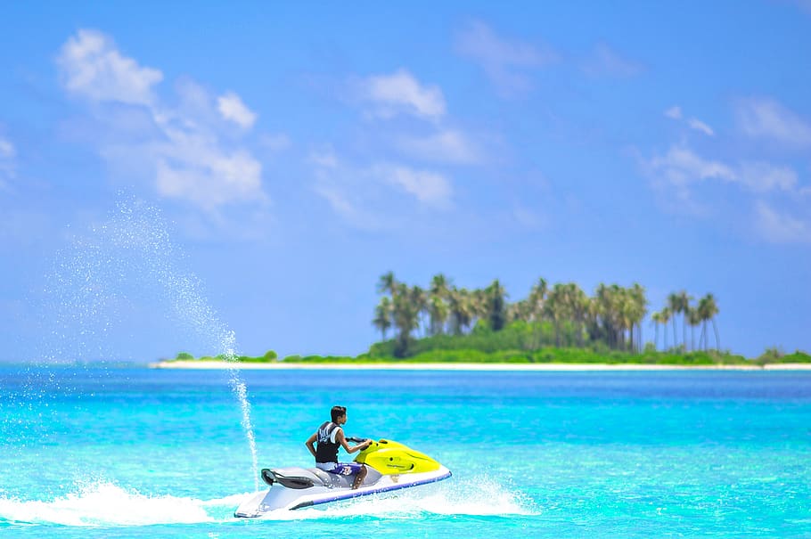 Person Riding on Personal Watercraft, beach, clouds, coastline HD wallpaper