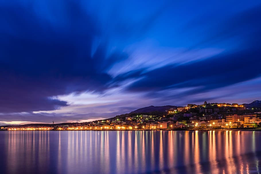 White Building Near Body of Water at Night, blue sky, city, clouds HD wallpaper