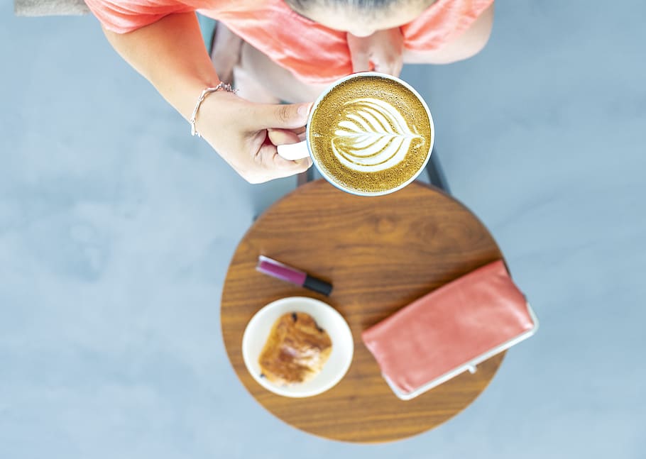 Top View Photography of a Woman Holding Coffee Cup, beverage HD wallpaper