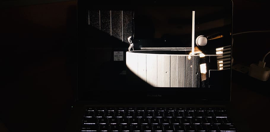 turned on MacBook Pro, studio, outdoors, night, lighting, laptop HD wallpaper