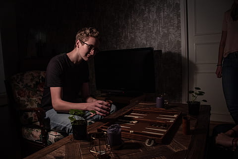 Man Sitting On Chair Near Table, backgammon, board game, games HD wallpaper