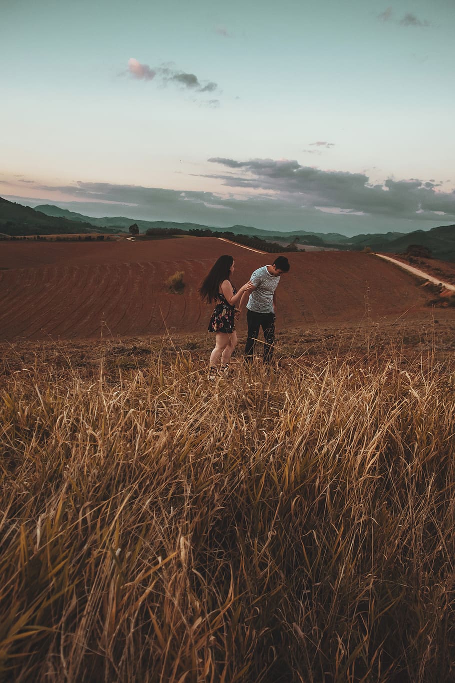 Man And Woman Standing On Brown Grass Field, couple, crop, cropland HD wallpaper