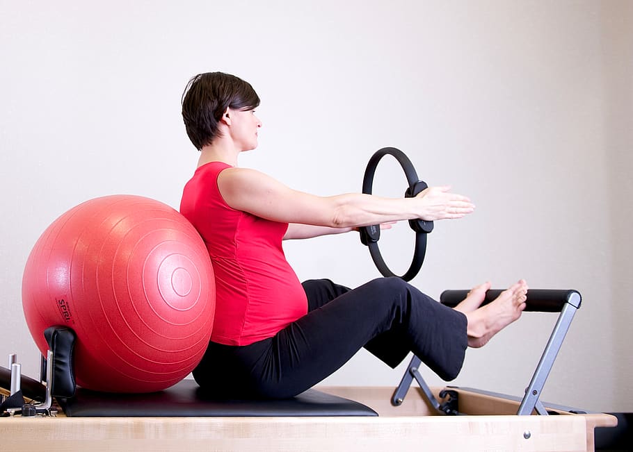 Woman in Red Shirt Sitting on Fitness Equipment, active, activity, HD wallpaper