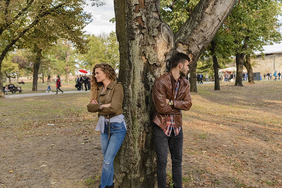 Man and Woman Wearing Leather Jackets Standing Under Tree, adults HD wallpaper