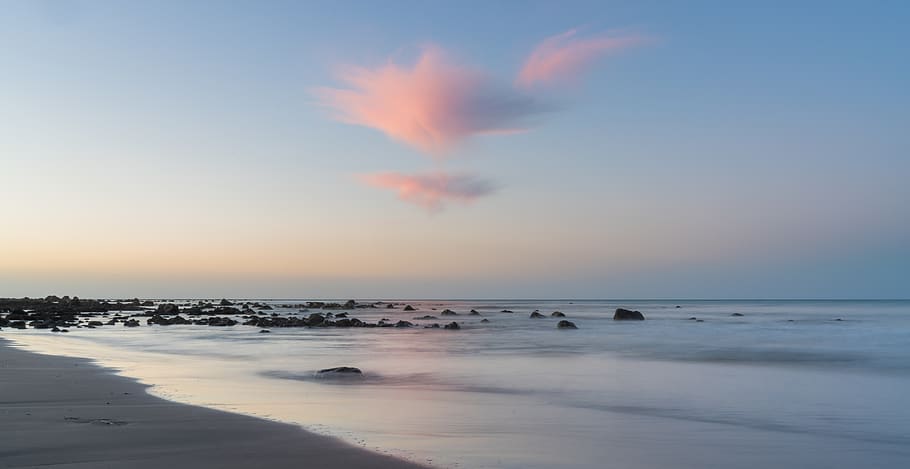seashore under blue sky, water, scenics - nature, sunset, beauty in nature HD wallpaper