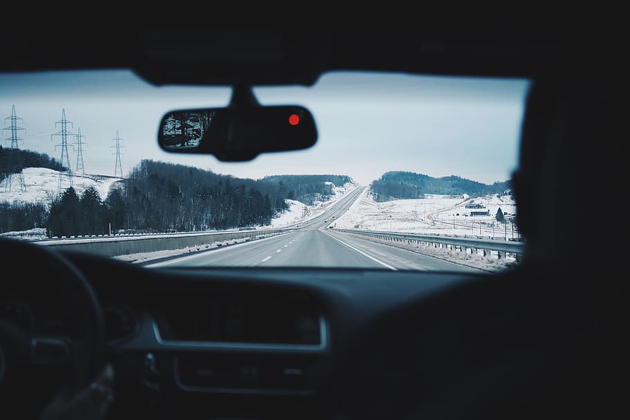 two people inside of car while driving on asphalt road between of land with covered of snow, HD wallpaper