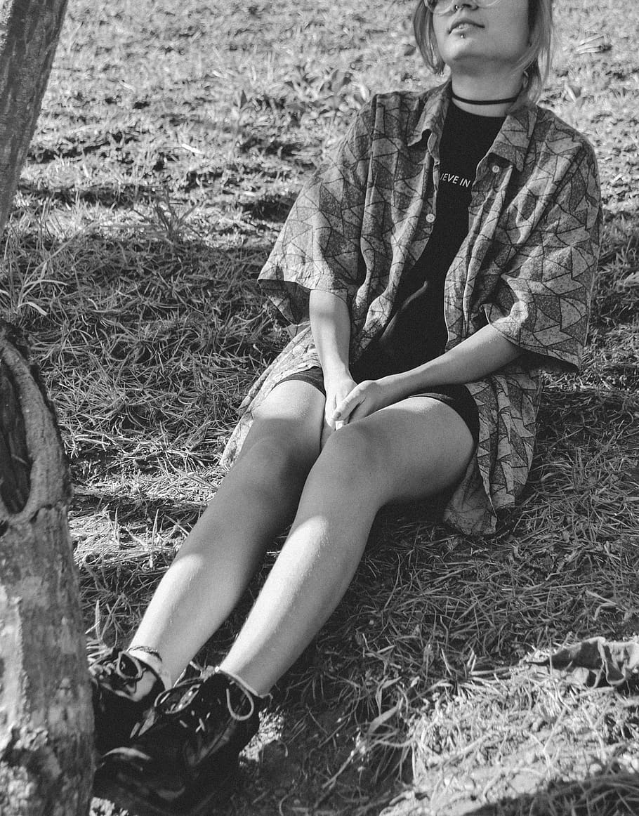 woman sitting on the ground under the tree, clothing, apparel