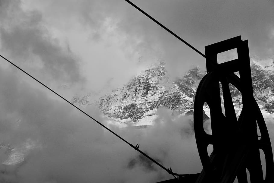Grayscale Photography of Pulley Near Mountain, cables, clouds HD wallpaper