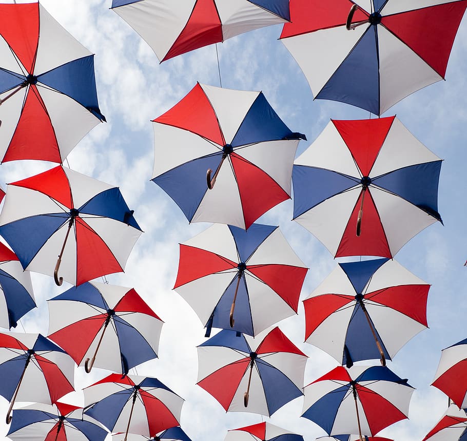 multicolored umbrella under blue sky, oosterhout, netherlands HD wallpaper