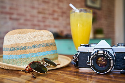 Gray and Black Dslr Camera Beside Sun Hat and Sunglasses, classic HD wallpaper