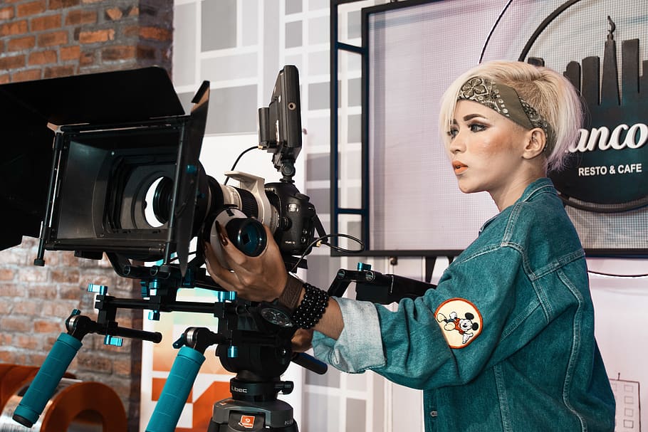 Woman Operating Video Recorder, camera equipment, denim jacket HD wallpaper