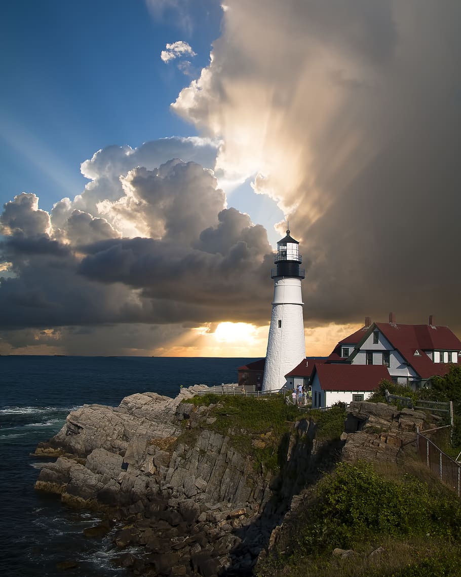 White and Black Lighthouse Near the Cliff and White and Red House HD wallpaper