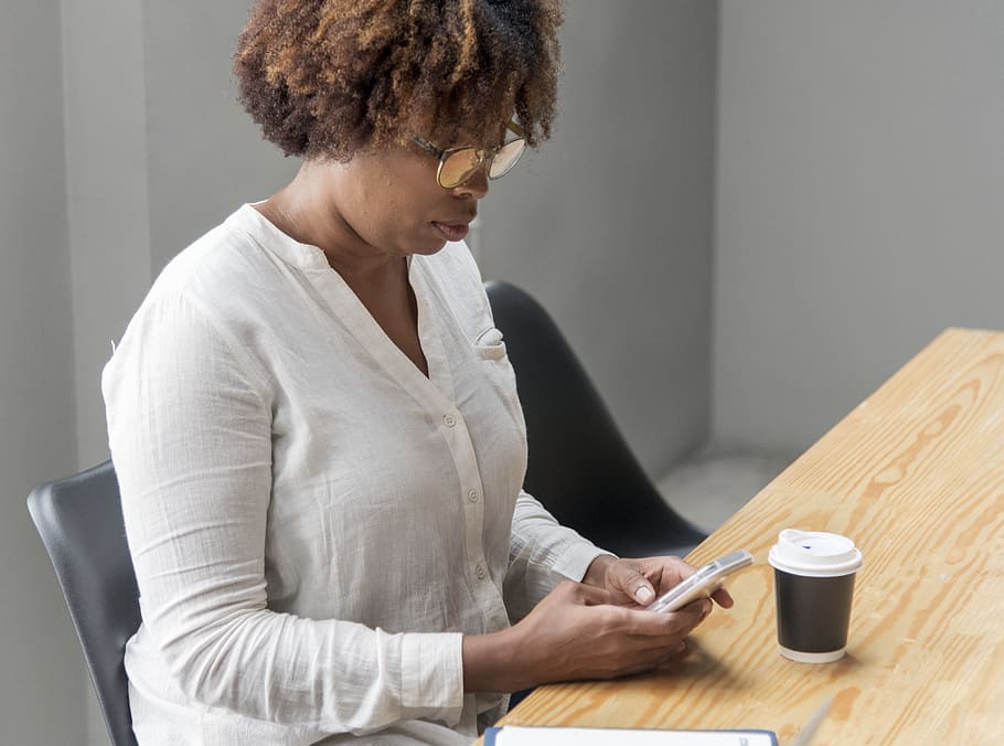 Woman Using Smartphone, afro, coffee, device, person, sitting HD wallpaper