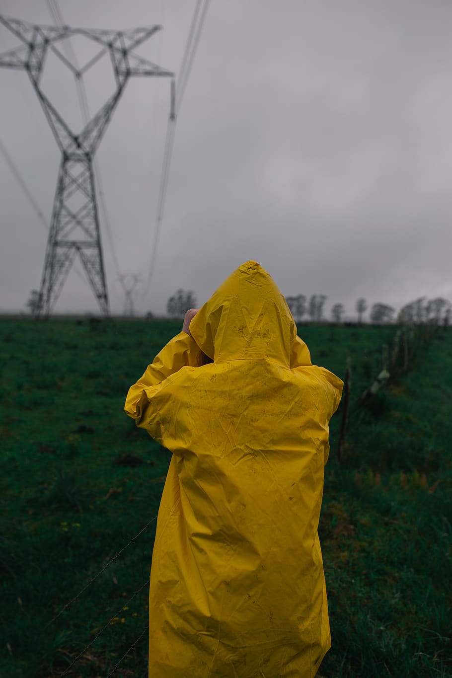 Person Wearing Yellow Raincoat, field, powerline, sky, environment, HD wallpaper