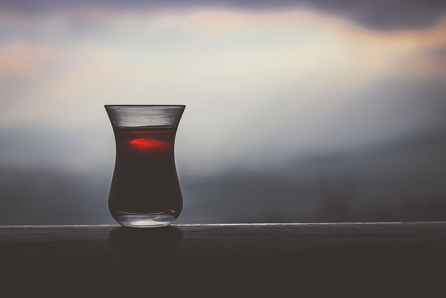 Close-Up Photo of Filled Turkish Tea Glass, beverage, blur, depth of field