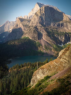 green trees beside mountains at daytime, lake, forest, jagged HD wallpaper