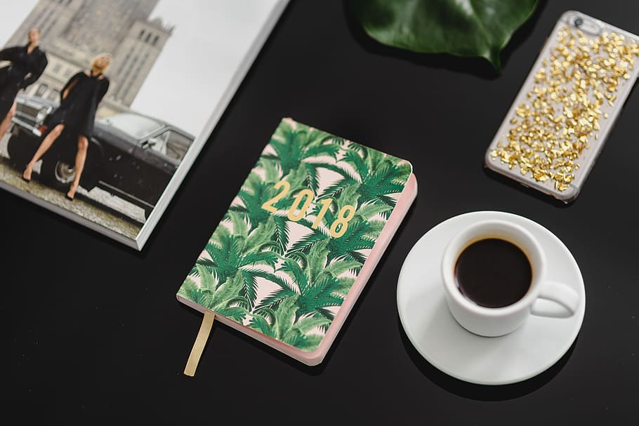 Top view of black table with 2018 calendar agenda, food and drink HD wallpaper