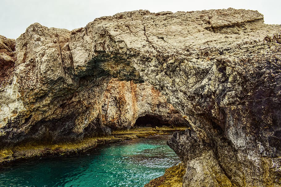 Rock Cliff Near Body of Water, arches, attraction, beach, cave HD wallpaper