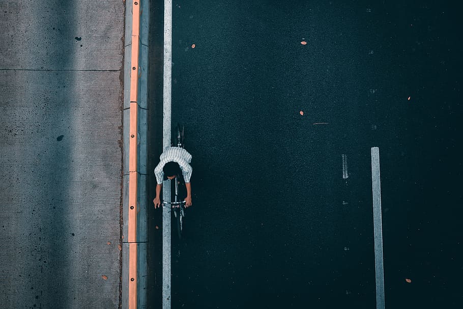 aerial view of person riding bike on the street, road, runway, HD wallpaper