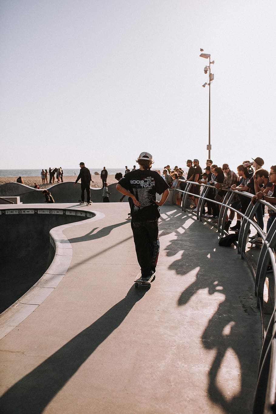 men doing skateboard tricks, real people, group of people, clear sky HD wallpaper