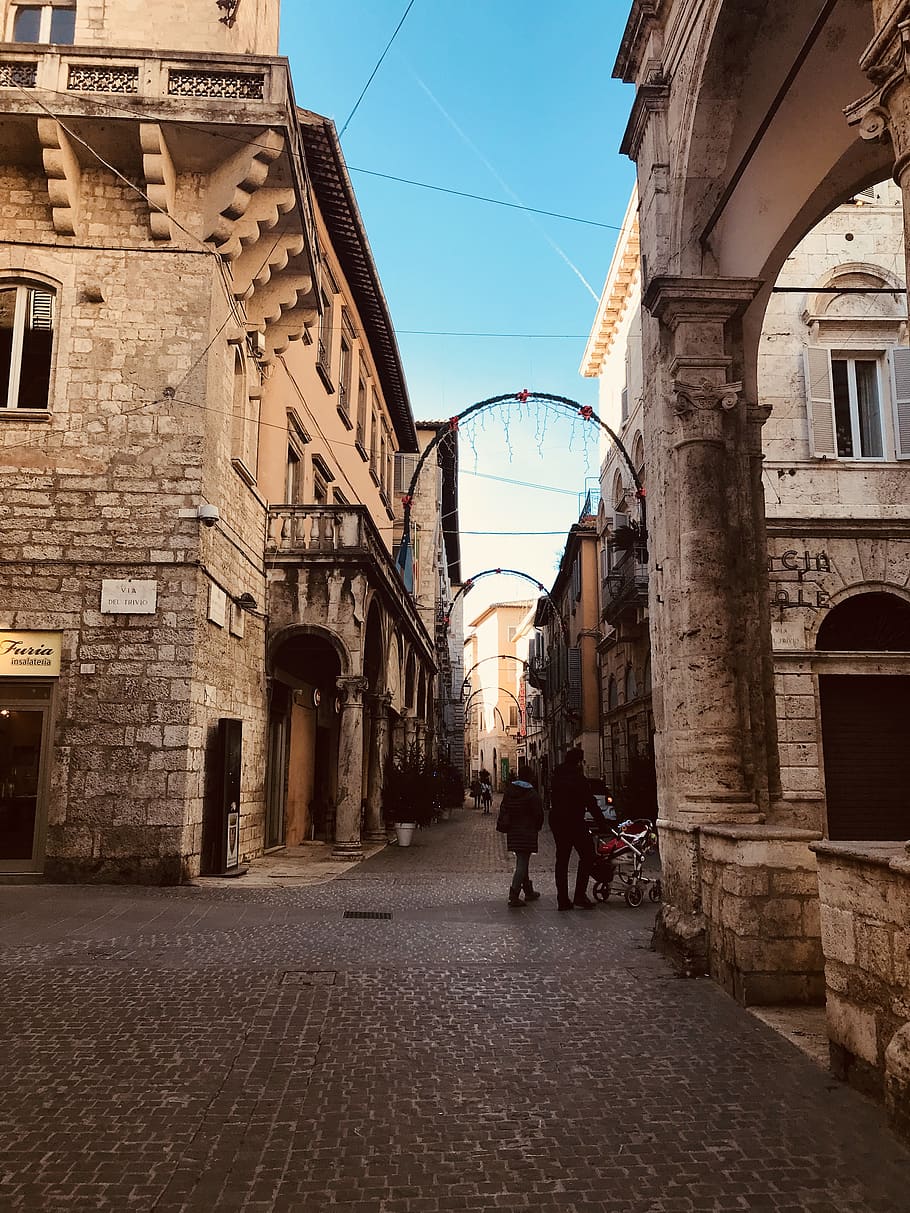 People on Road Between Concrete Buildings, ancient, architecture HD wallpaper