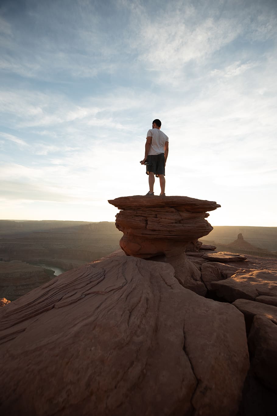 man standing on peak, sky, rock, solid, rock - object, real people HD wallpaper