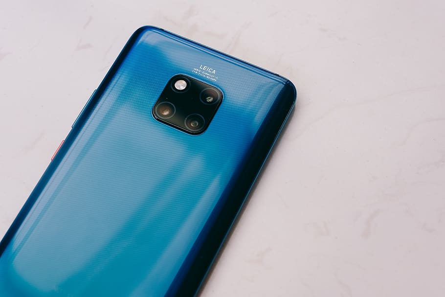 blue Android smartphone on white surface, technology, indoors HD wallpaper