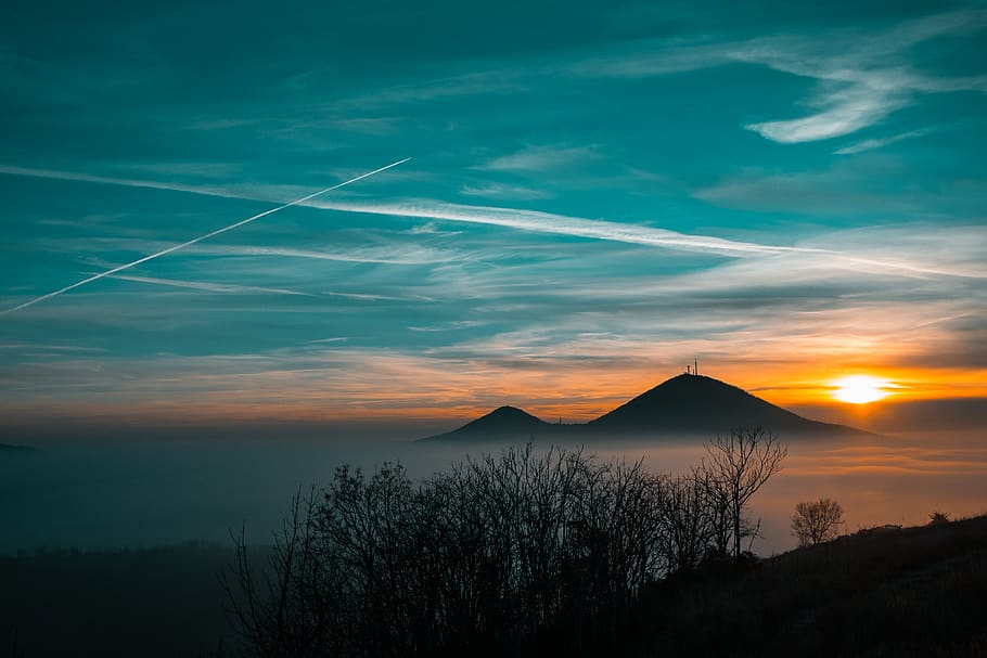 green trees across mountain, nature, outdoors, sky, sunset, dawn HD wallpaper