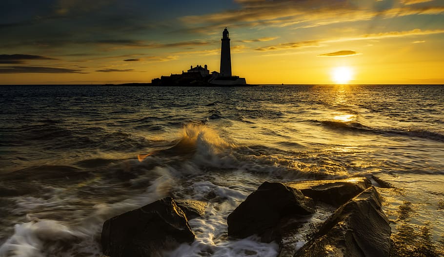 Body of Water Near Lighthouse during Golden Hour, beach, beautiful HD wallpaper