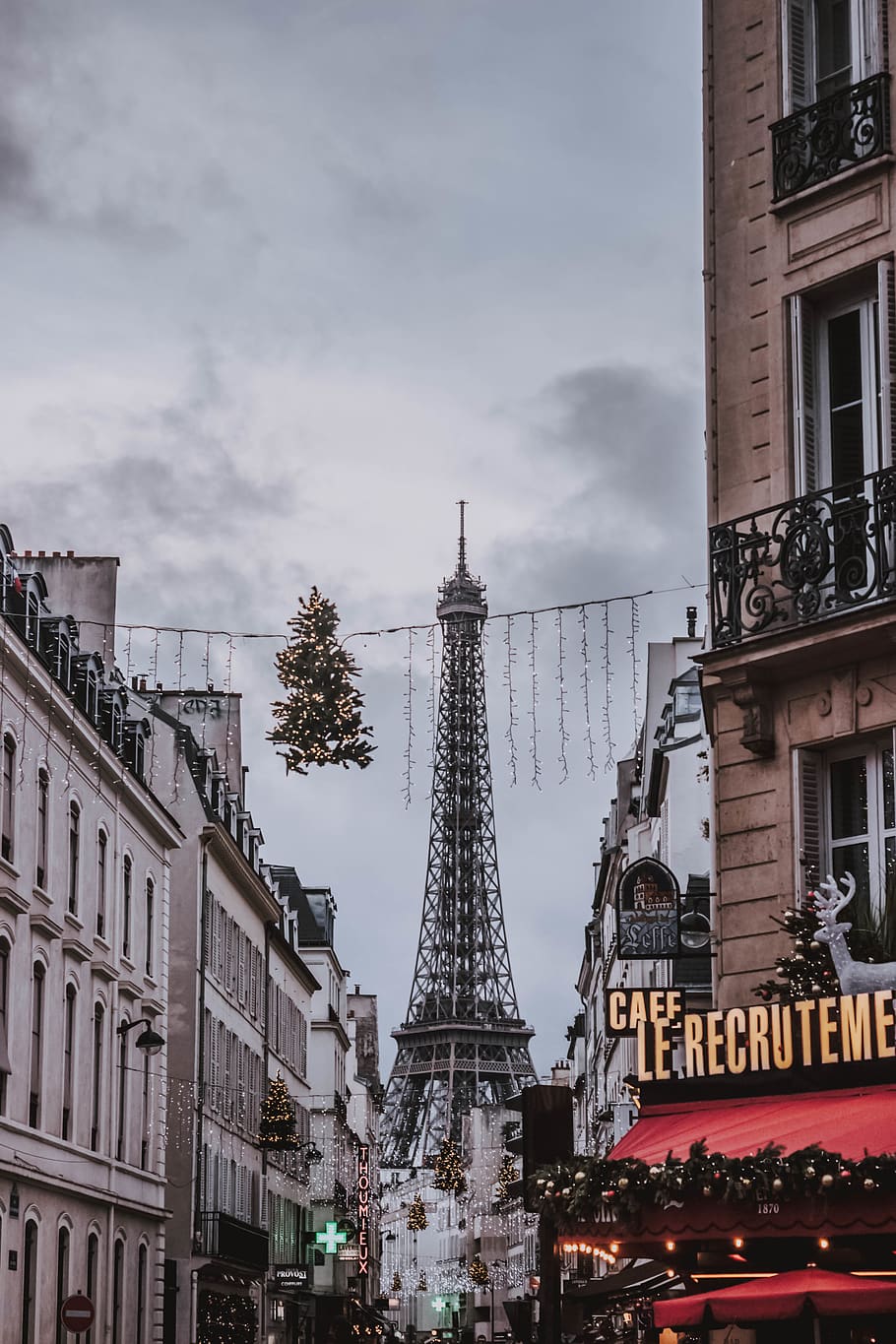 view of Eiffel tower in between concrete buildings at daytime, HD wallpaper