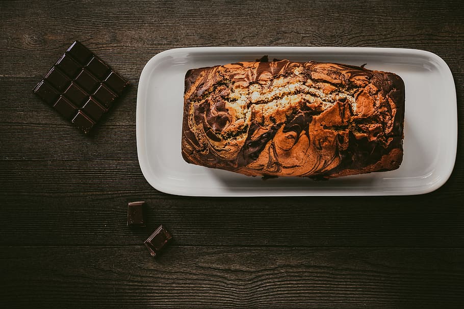 Chocolate Cake In White Plate Beside Chocolate Bars, delicious HD wallpaper