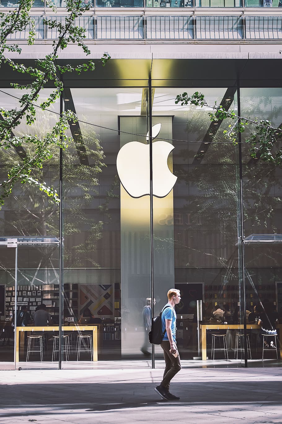 Man Passing An Apple Store, architecture, building, person, street HD wallpaper