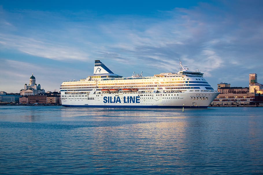 white and blue Silja Line cruise ship during daytime, transportation