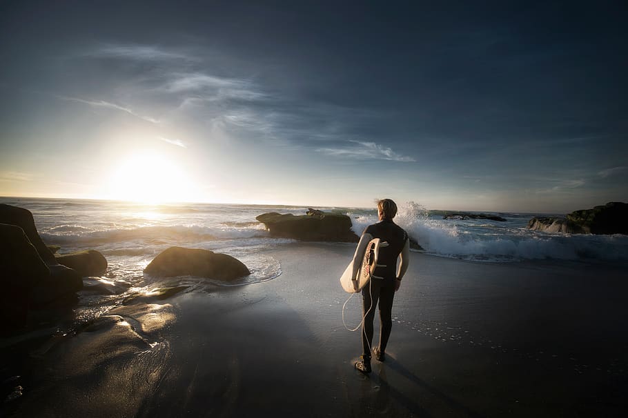 beach, man, ocean, rocks, sand, sea, seascape, seashore, sky HD wallpaper