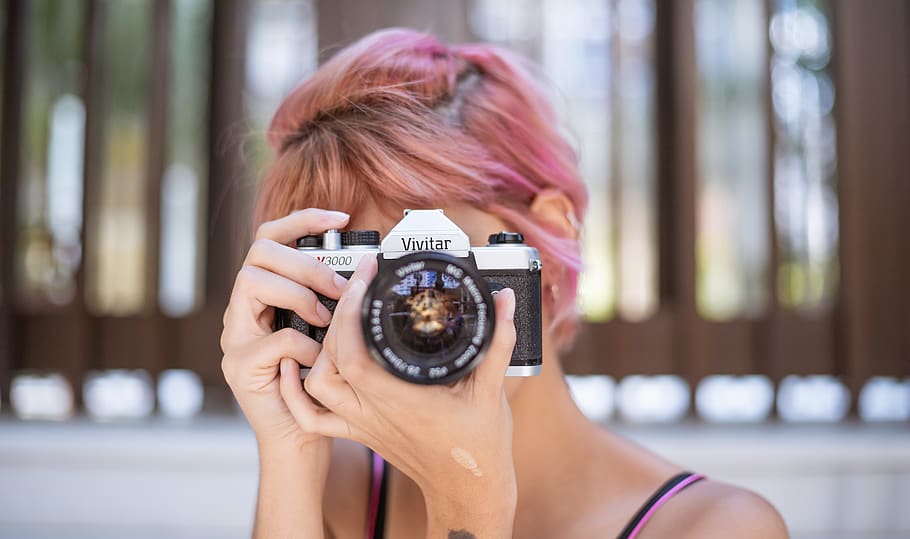 Woman Holding Vivitar Camera, black hands, blurred background HD wallpaper
