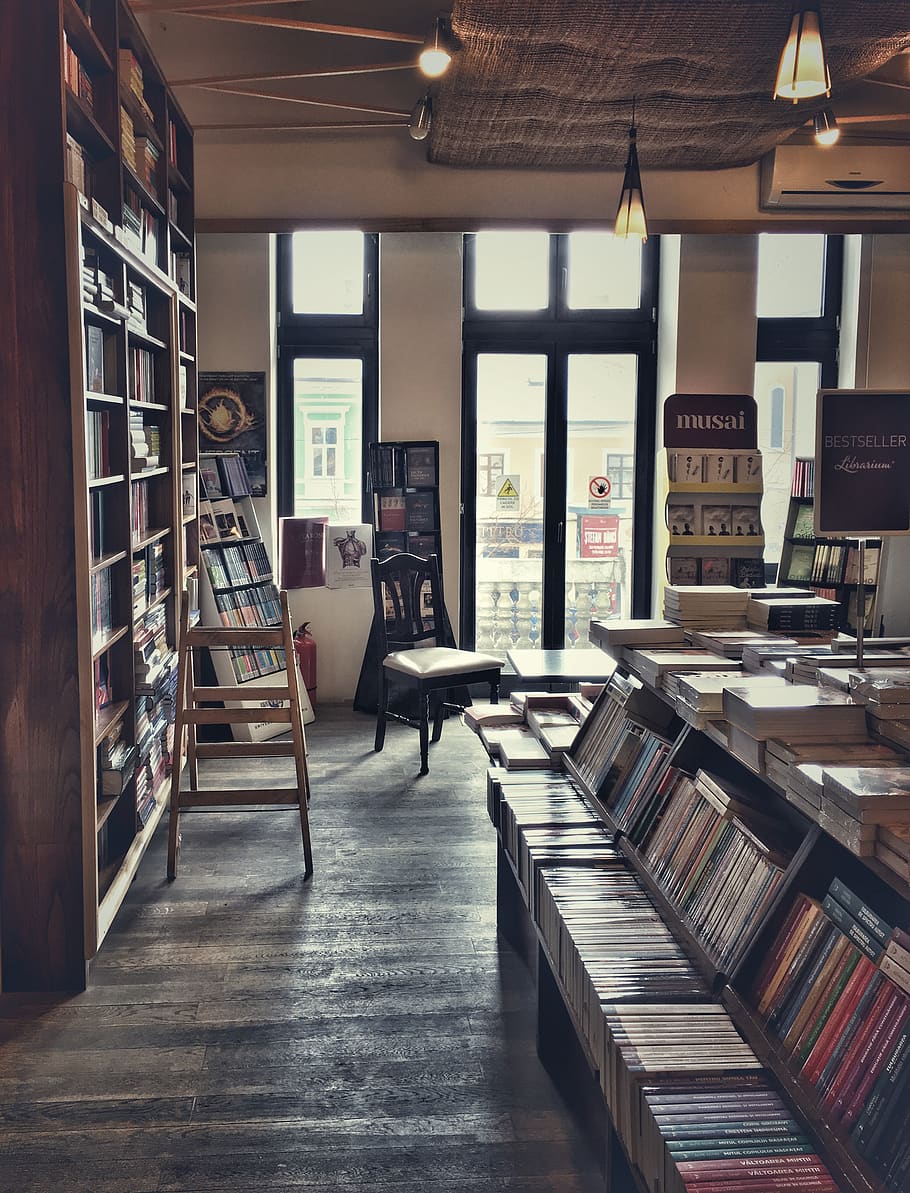 books inside bookstore, indoors, window, day, table, publication HD wallpaper