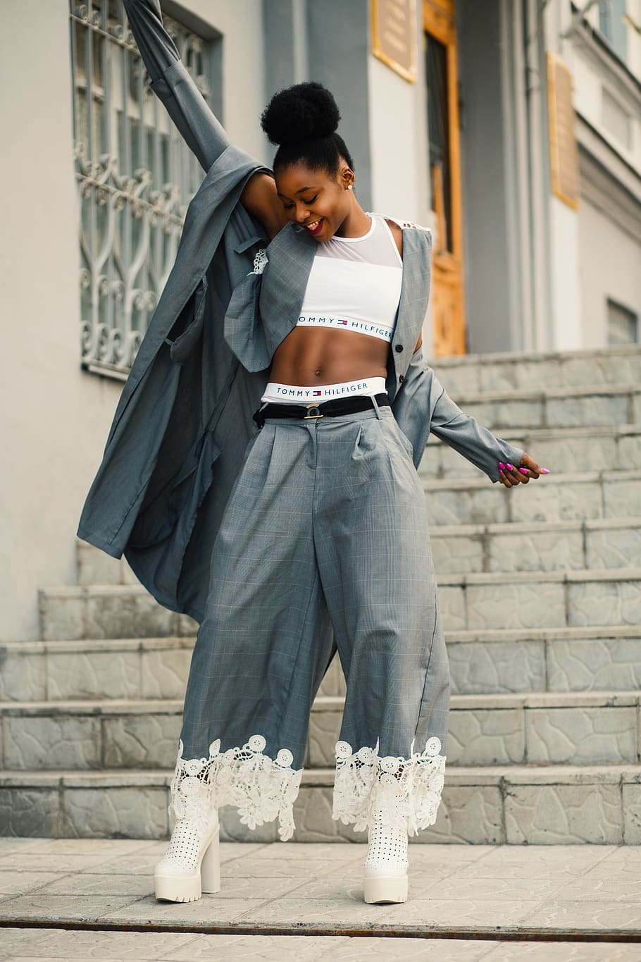 Woman in Gray Blazer Stands on Gray Concrete Floor, architecture HD wallpaper