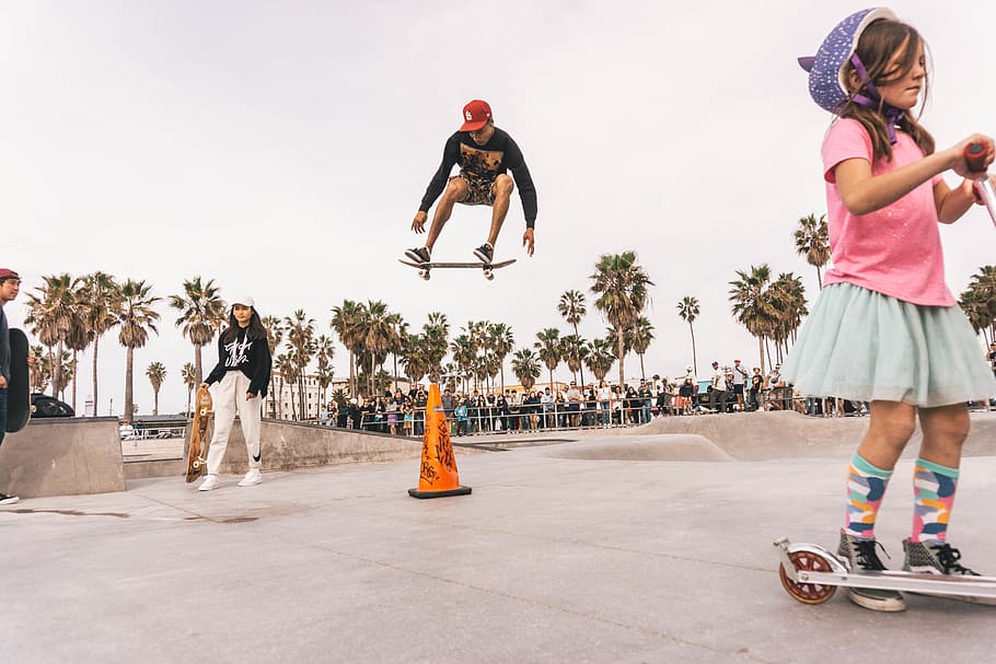 man riding on skateboard, full length, group of people, real people HD wallpaper