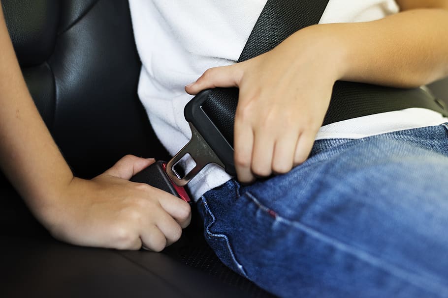 Person Locking Seat-belt, boy, car, child, close-up, hands, indoors
