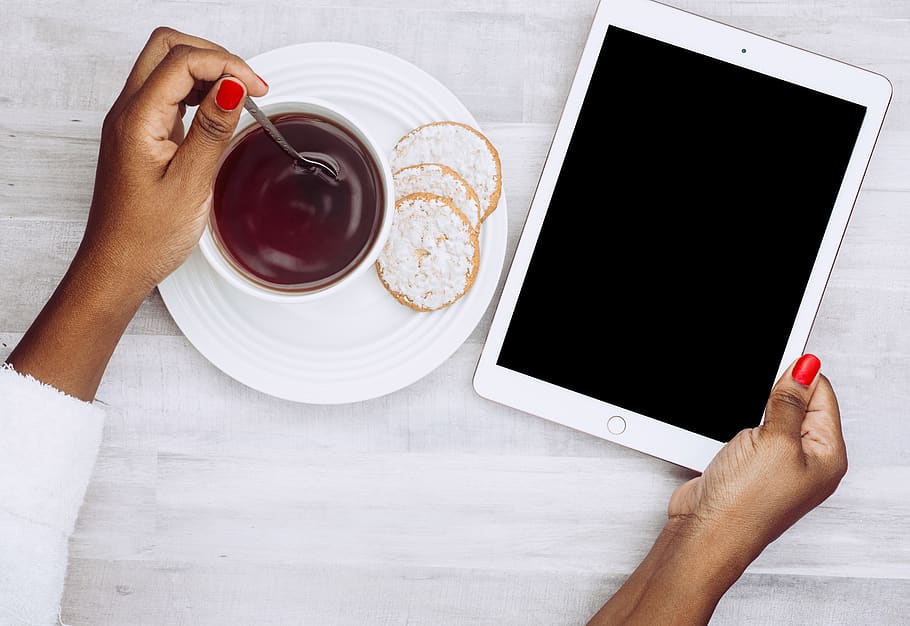 Person Holding Ipad, beverage, coffee, cookies, drink, electronics HD wallpaper