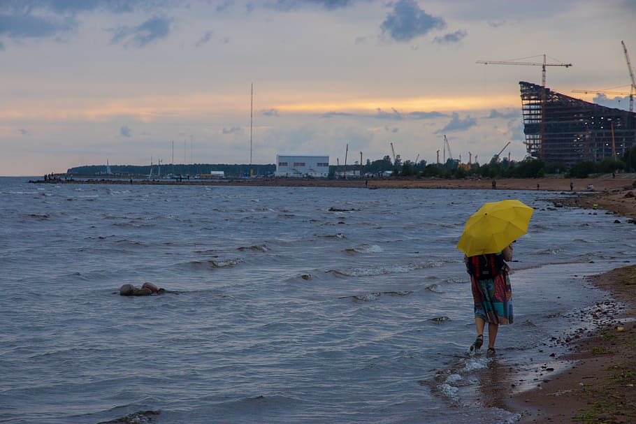 beach, city, umbrella, water, sky, real people, sea, one person HD wallpaper
